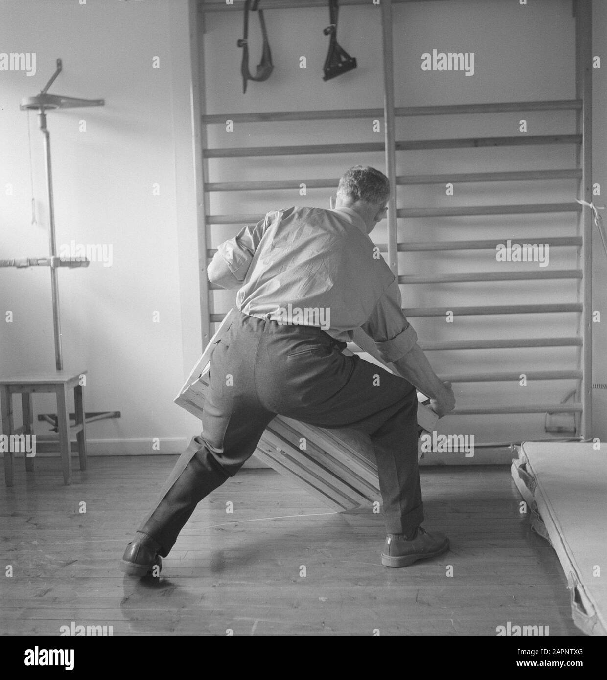 men, buildings, interior, wall racks Date: undated Keywords: buildings ...
