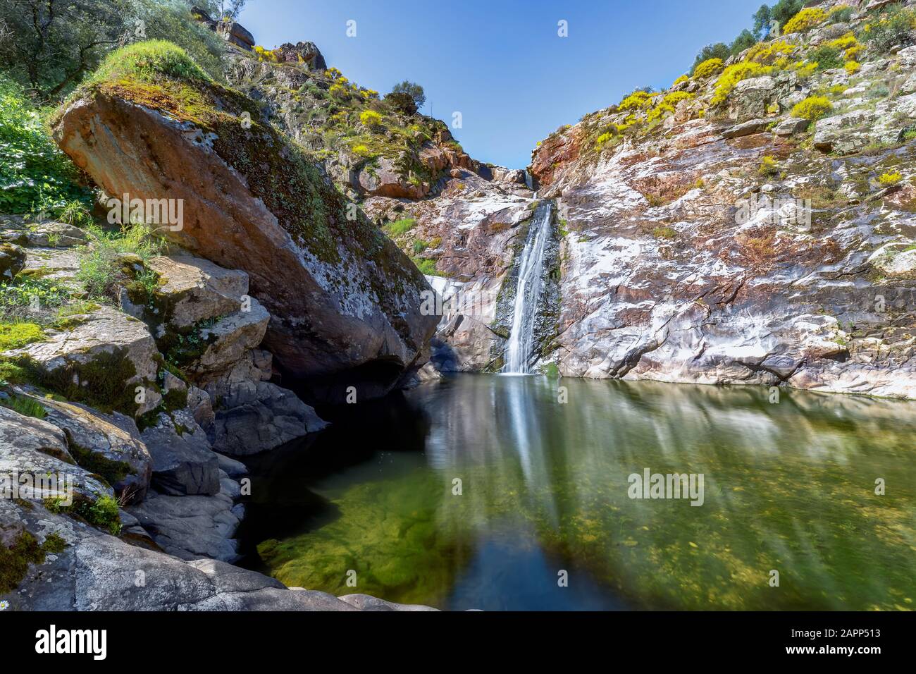 Colorfull River waterfall in mountain. Waterfall mountain wall scene. Mountain waterfall view Stock Photo