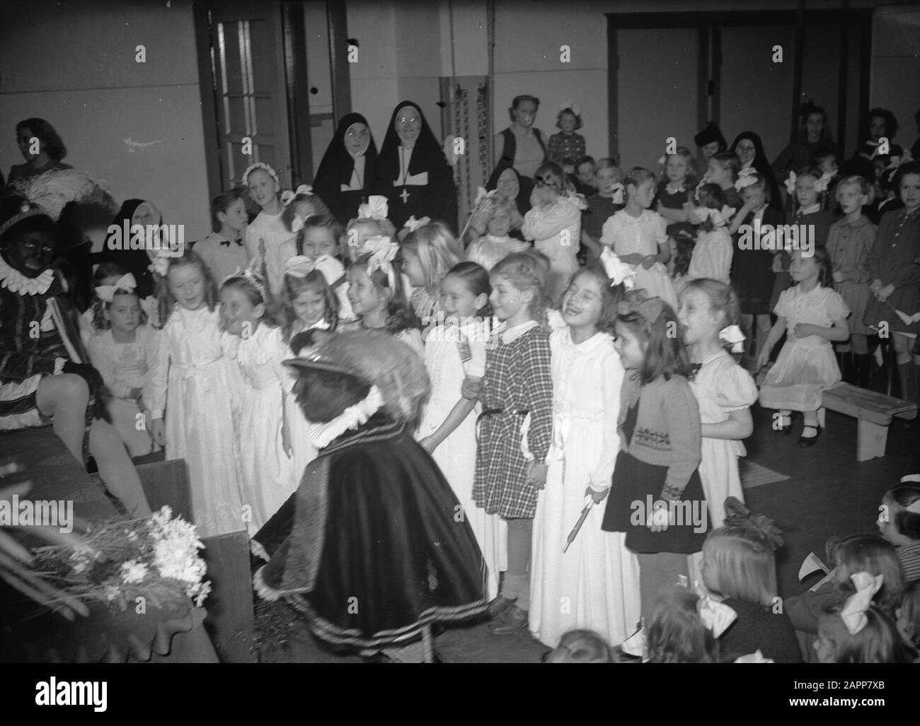 Sint Nicholas at Prinsenschool, Prinsengracht 781 Date: December 3, 1948 Location: Amsterdam Keywords: pupils, schools Stock Photo