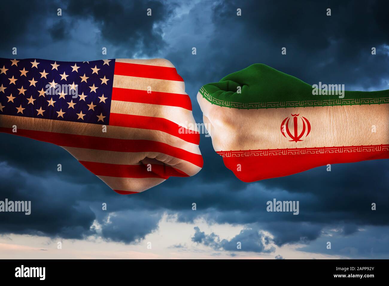 Two fists with the flags of America and Iran. The concept of confrontation between states Stock Photo