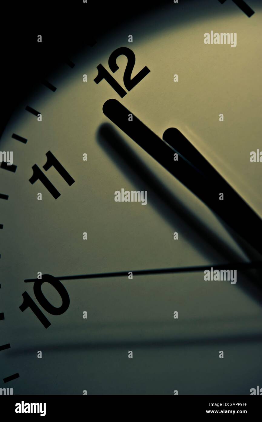 pocket watch indicating one minute to midnight, concept for doomsday