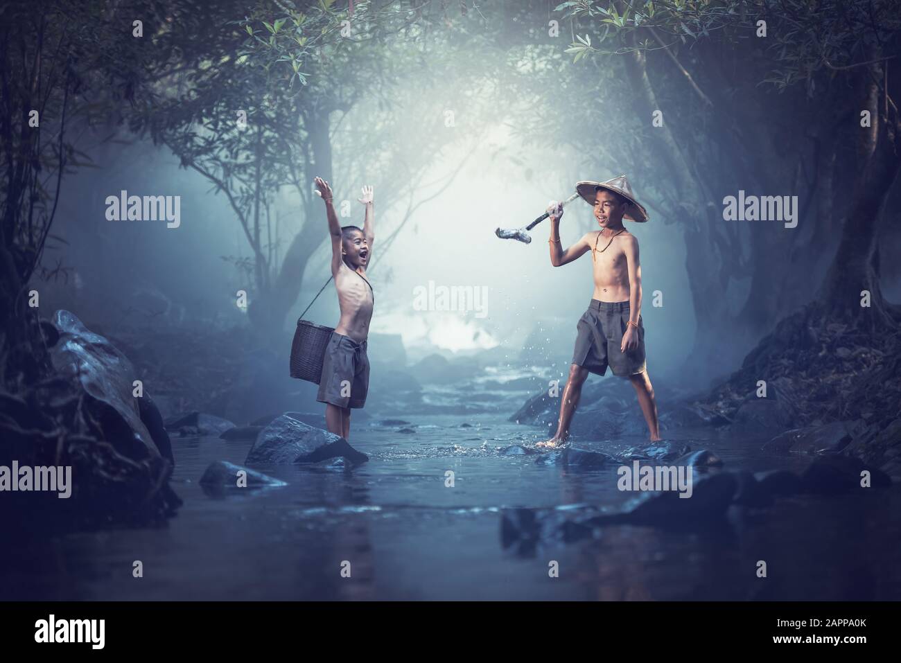 Two boys fishing in river hi-res stock photography and images - Alamy