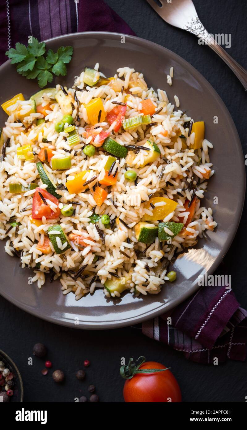 Vegetable Sources And Rice Rice with vegetables, healthy vegetarian food Stock Photo - Alamy