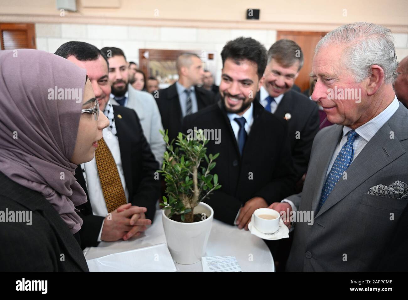 The Prince of Wales speaks with Rua Ahmed Abuoda (left) from the Nor's Women Empowerment Group and other Palestinian refugees at the Casa Nova Franciscan pilgrim house in Bethlehem in the Occupied Palestinian Territories on the second day of his visit to region. PA Photo. Picture date: Friday January 24, 2020. See PA story ROYAL Charles. Photo credit should read: Neil Hall/PA Wire Stock Photo