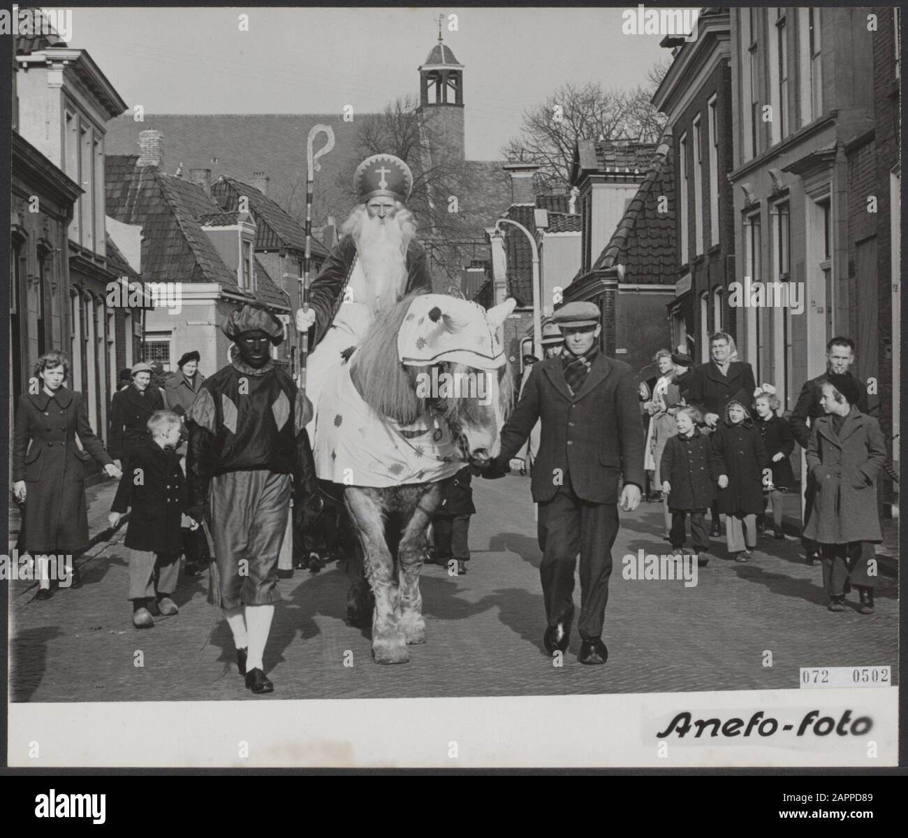 festivities, folklore, Sint-Pieter Date: 21 February 1951 Location: Grouw Keywords: festivities, folklore Personname: Sint-Peter Stock Photo