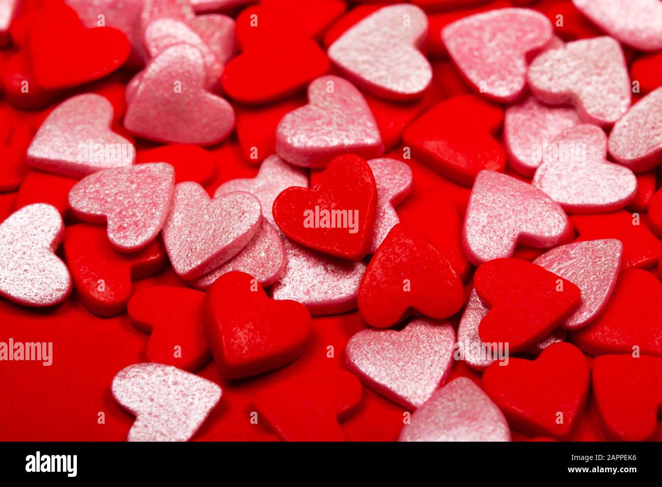 Lots of red and pink hearts. The concept of St. Valentine's Day, love, sweets Stock Photo