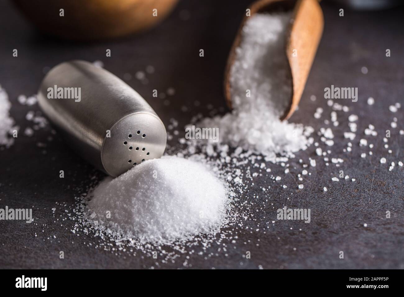 Sea and kitchen mineral salt spoon and shaker Stock Photo