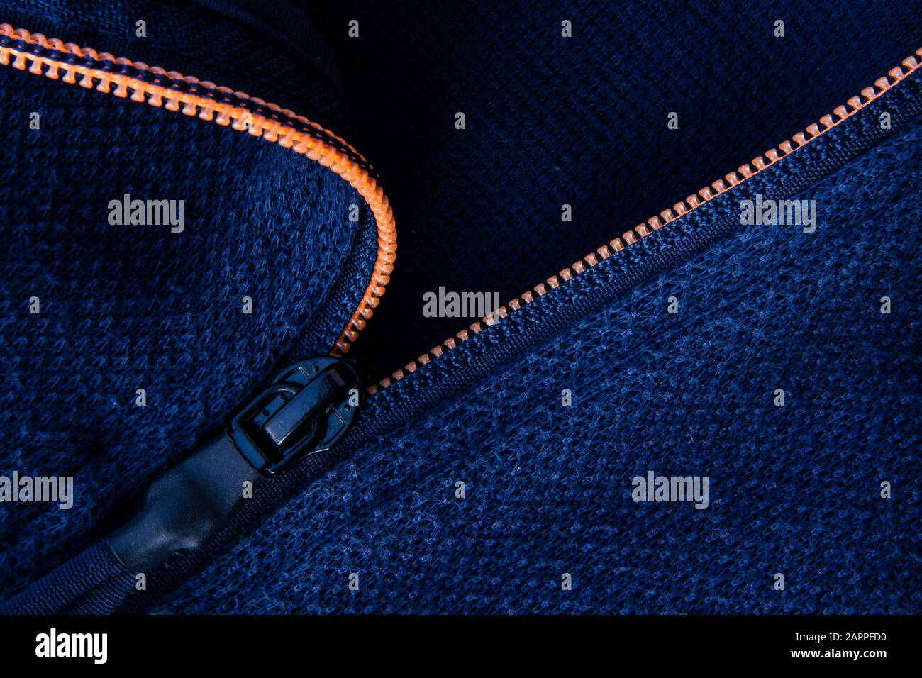 Ready made garments men's jacket zipper closure close up with blue ...