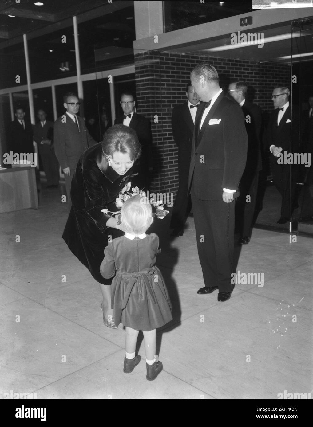 Princess Beatrix and her fiancée Claus von Amsberg at premiere of the film Tokyo Olympiad in Amsterdam  documentaries, princesses, premieres, film, Beatrix, princess Annotation: Documentary film directed by Kon Ichikawa about the 1964 Summer Olympics in Tokyo Date: 15 October 1965 Location: Amsterdam, Noord-Holland Keywords: documentaries, film, premieres, princesses Personal name: Beatrix, princess Stock Photo