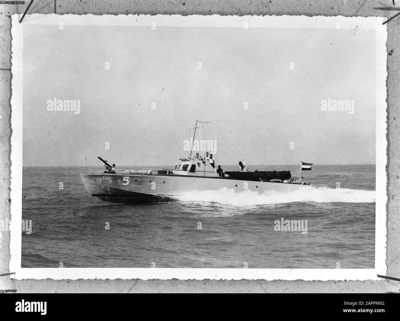 Torpedomotor boat [Mosquito boat] of the Royal Navy in the Dutch East Indies Annotation: Repronegative. Subject TM5 [built in the Dutch East Indies] Date: 1940-1945 Location: Indonesia, Dutch East Indies Keywords: navy, warships, World War II Institution name: RNN Stock Photo