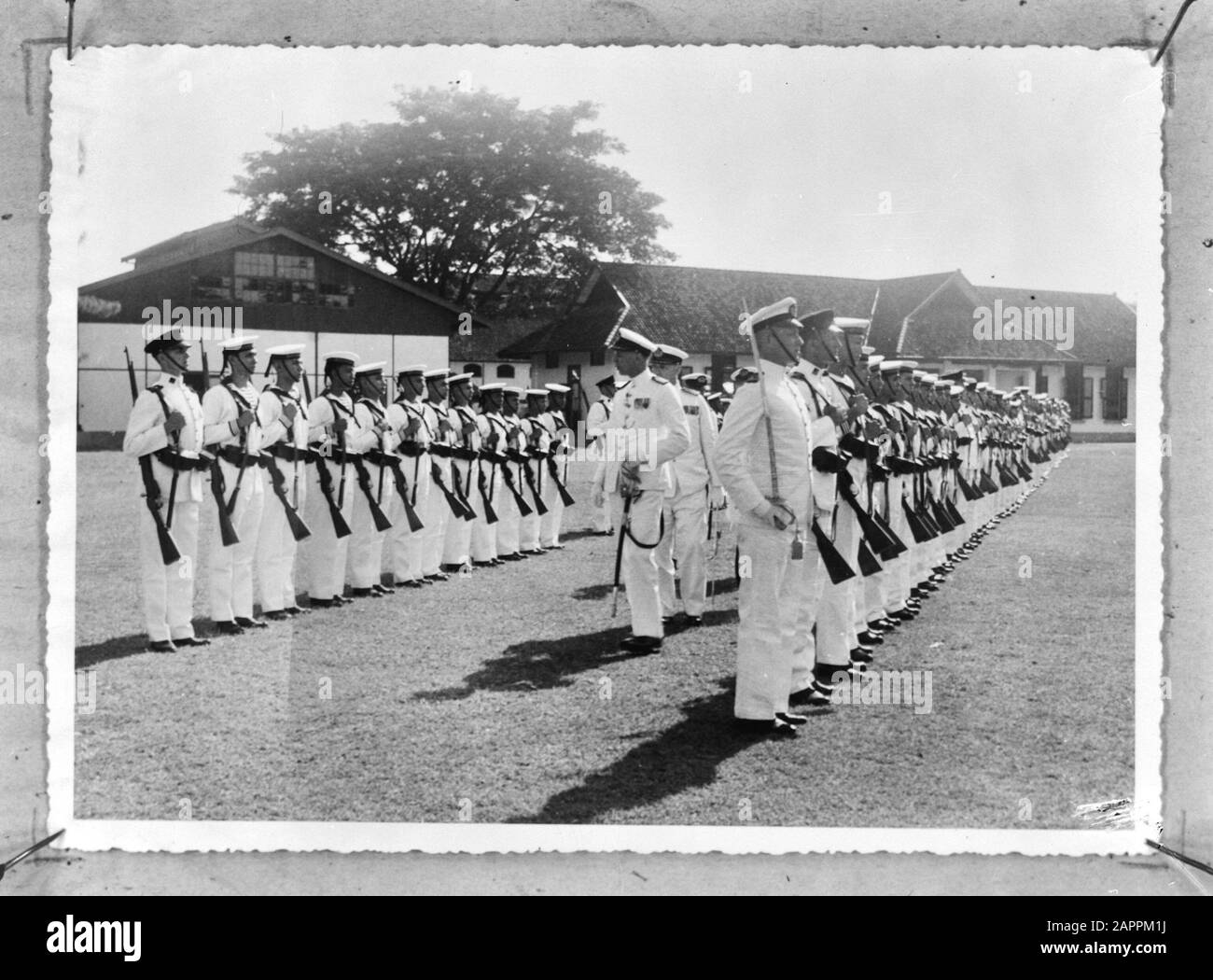 inspection of an honorary guard in Surabaya, Dutch East Indies by the  Commander Navy in Surabaya (from 1937-1939) captain at sea A.C. van der  Sande Lacoste]] Date: {1940-1945} Location: Indonesia, Dutch East