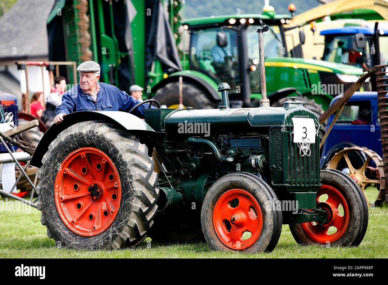 Llanelwedd, Wales, Royal Welsh Show, July 2012. Vintage machinery in the main ring at the Royal Welsh Show ©PRWPhotography Stock Photo
