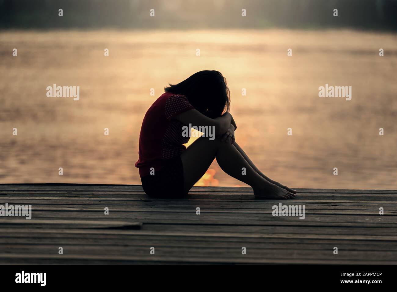 Woman silhouette sad High Resolution Stock Photography and Images - Alamy
