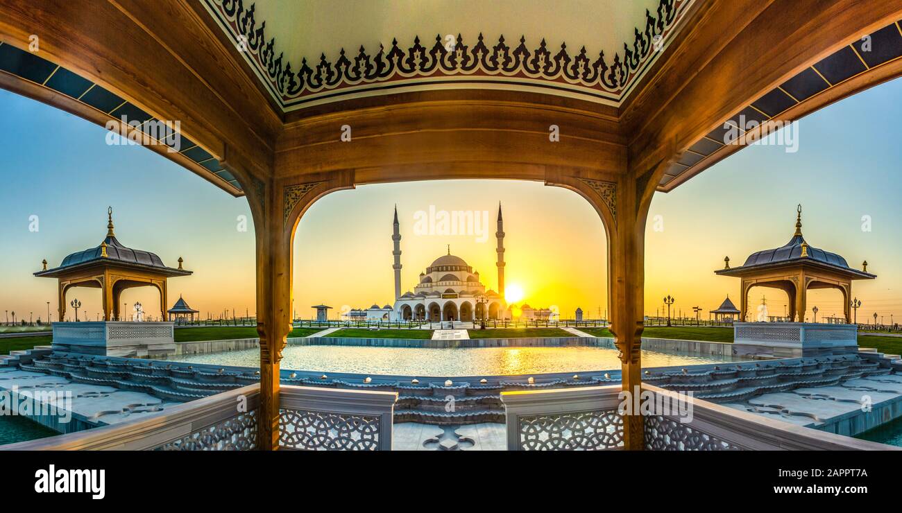 Wide angle view of Sharjah New Mosque famous Tourist Destination in Dubai Arabic Letter means: Indeed, prayer has been decreed upon the believers a de Stock Photo