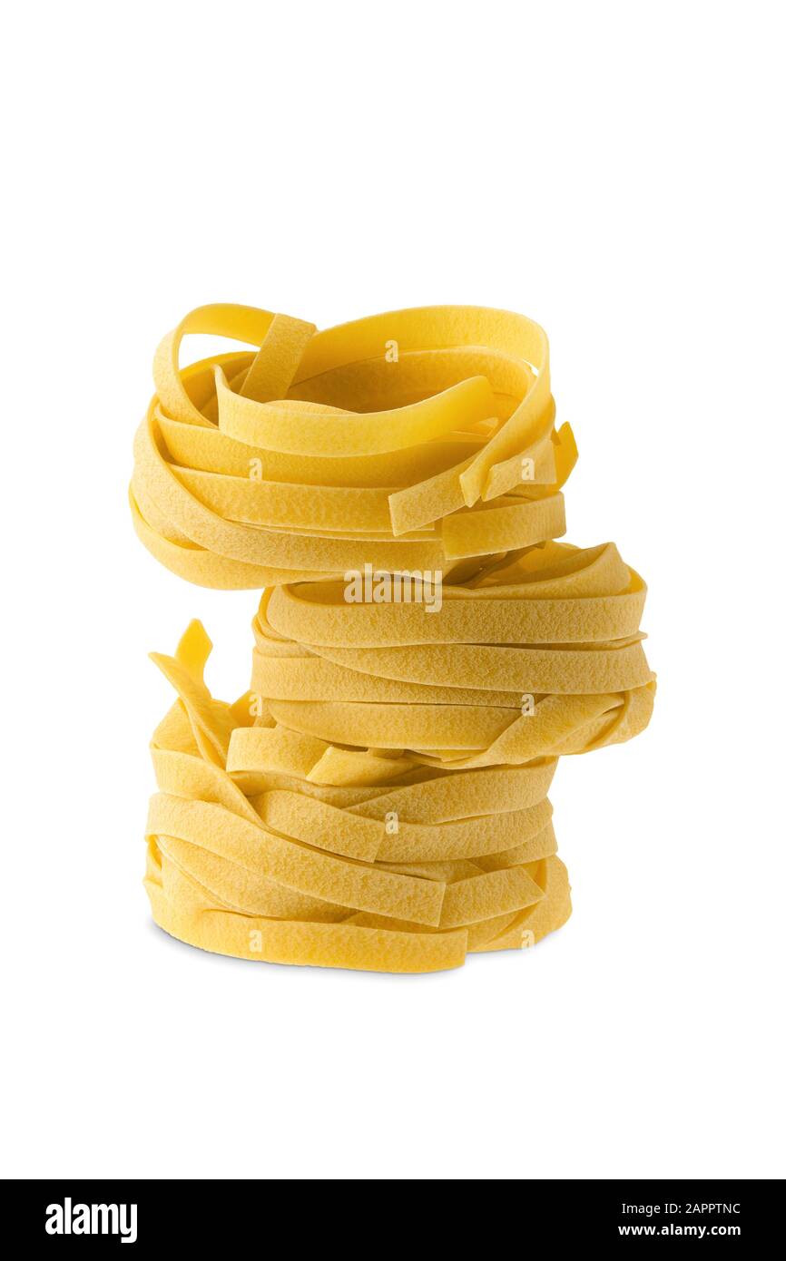 Nest noodles isolated on white background. Italian tagliatelle with egg