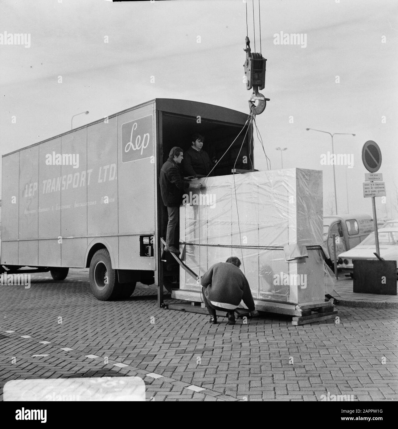 Cargo handling cranes Black and White Stock Photos & Images - Alamy