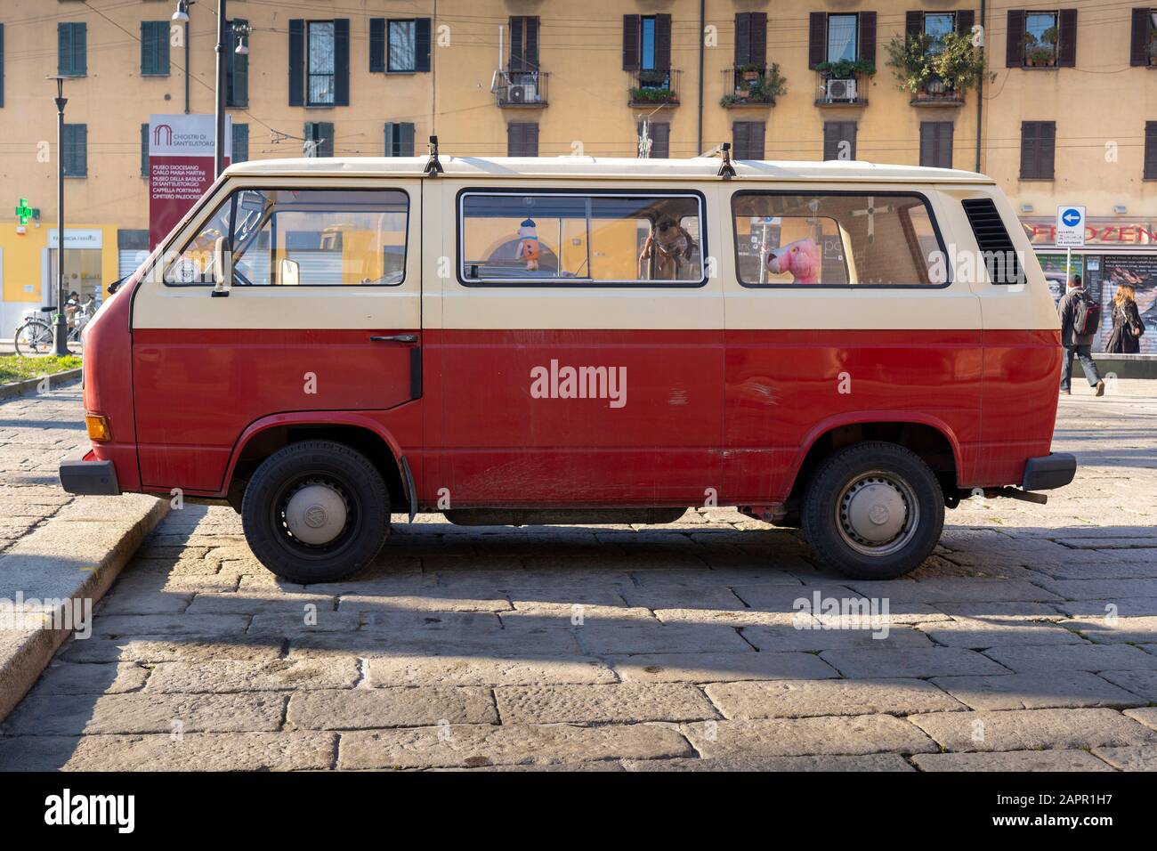 Red and white vintage Volkswagen camper van. VW transporter microbus. Stock Photo