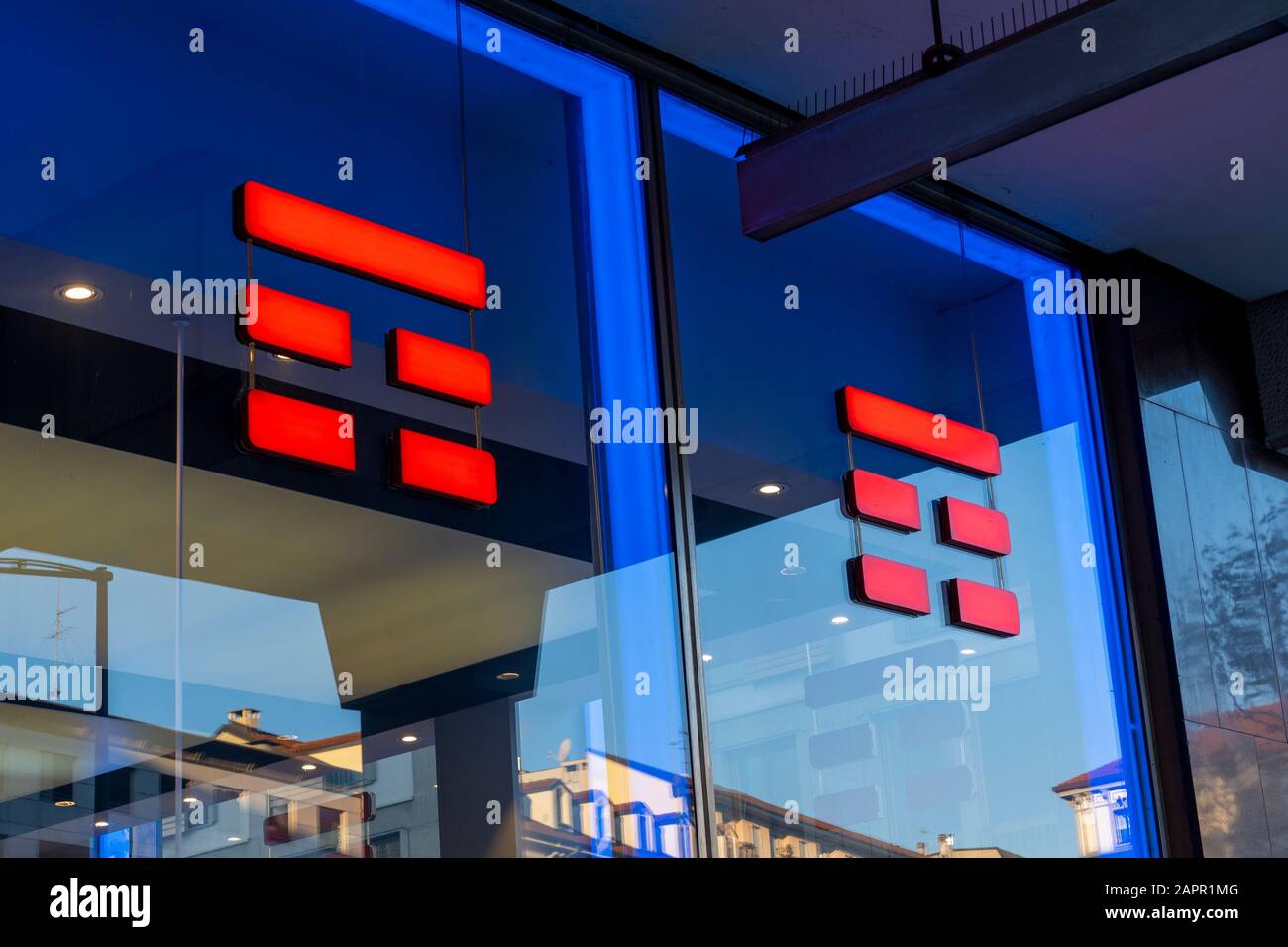 TIM logo sign on mobile phone store. Telecom Italia Mobile, also known as  TIM, is an Italian mobile phone network brand Stock Photo - Alamy