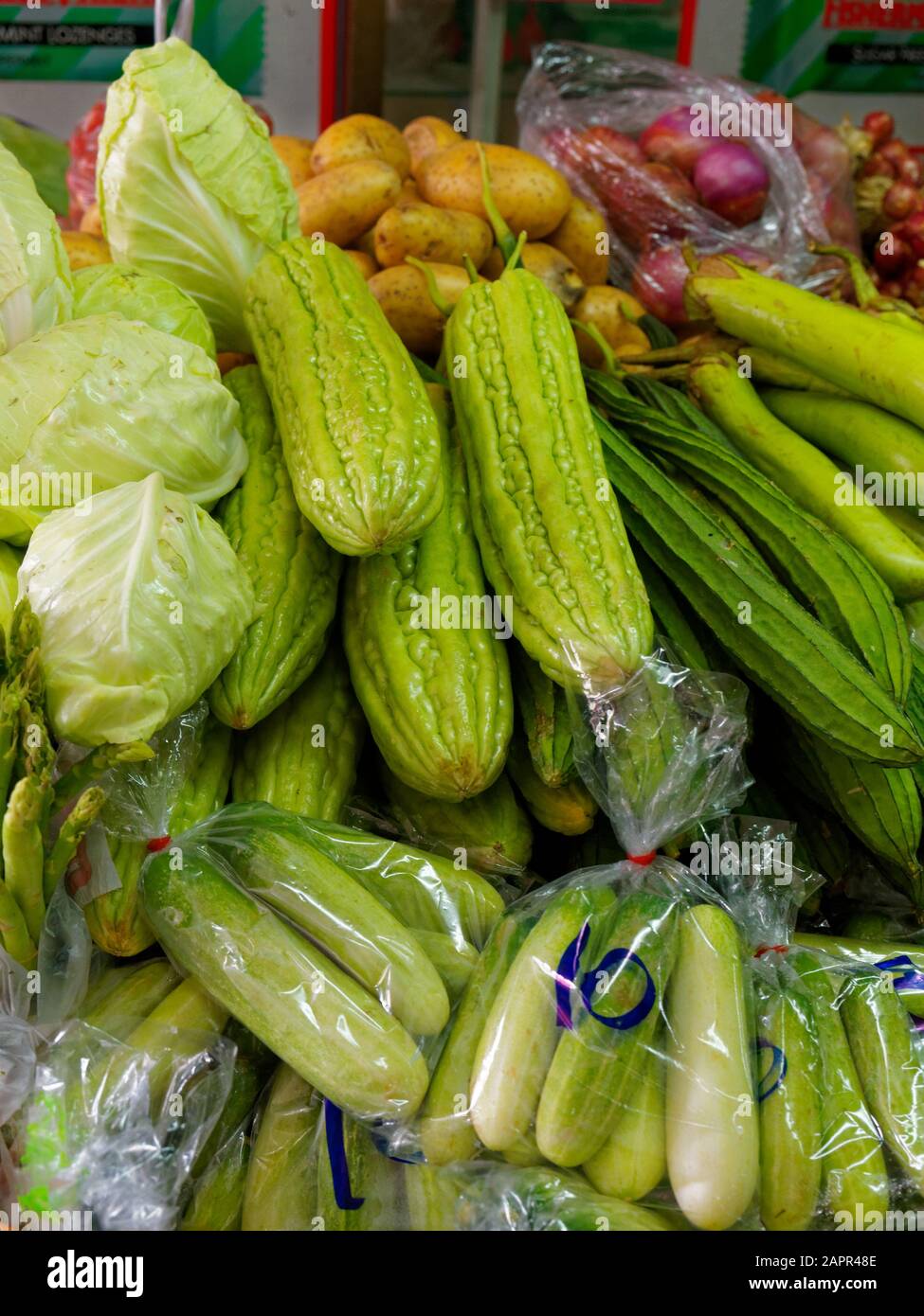 Cucumber, Luffa acutangola, Buap liam, White cabbage, potato, onion, Market, Chiang Mai, Thailand, Asia Stock Photo
