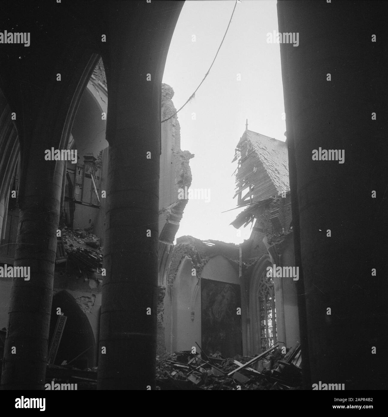 Vernielingen: Roermond  The nave of the destroyed Saint Christopher Cathedral in Roermond Date: March 1945 Location: Limburg, Roermond Keywords: churches, Second World War, destruction Stock Photo