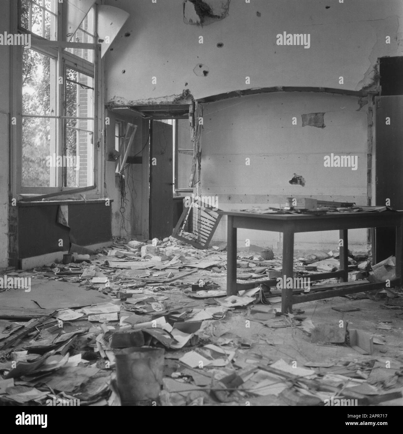 Destruction: Bemmel e.o.  [Destroyed interior.Probably classroom] Date: 1945 Keywords: buildings, World War II, destruction Stock Photo