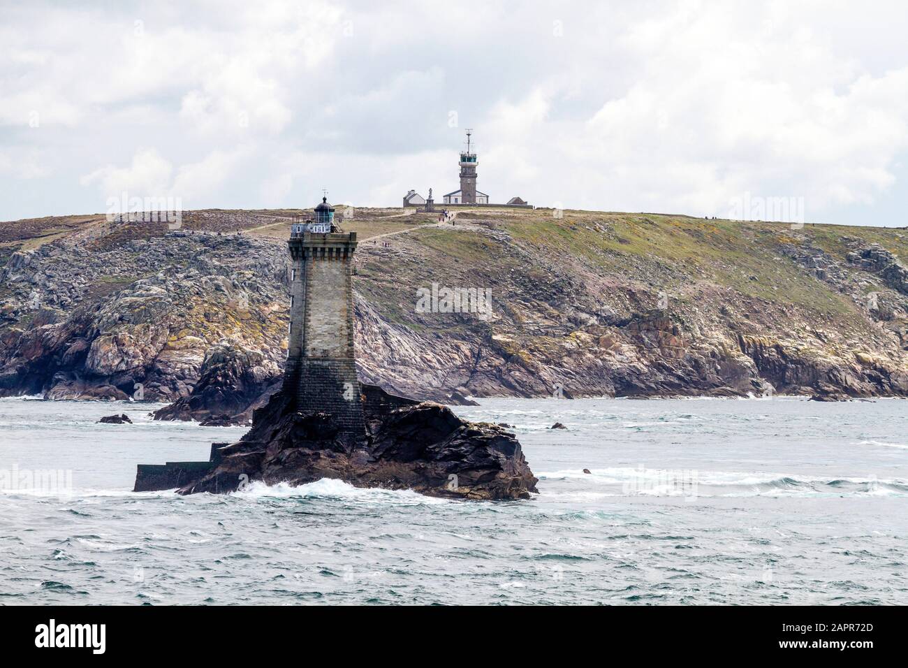 The inner end of the Raz., looking from the sea and Phare de la Vielle towards the Lighthouse onshore Stock Photo
