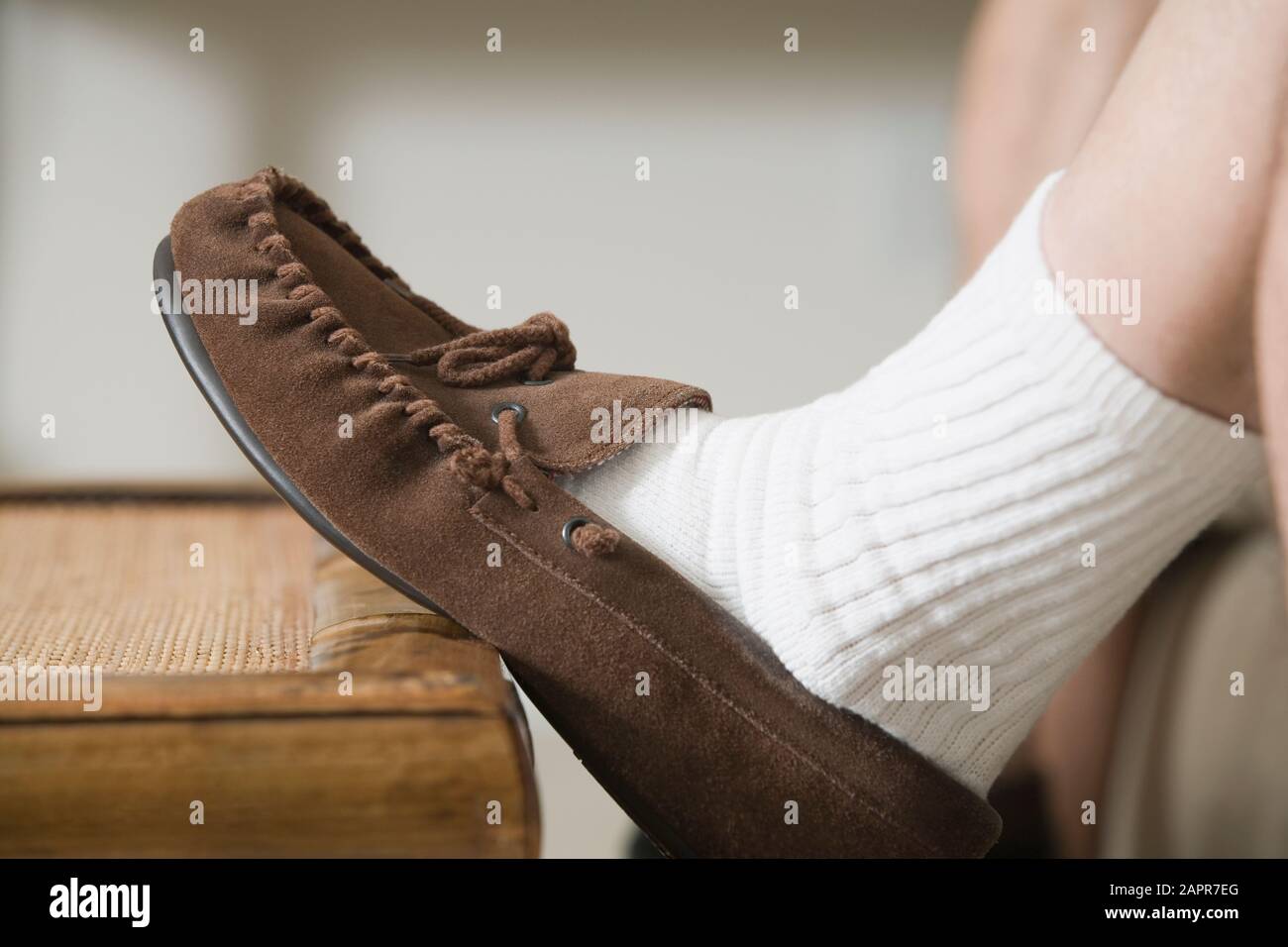 Closeup of a man's foot in a slipper Stock Photo Alamy