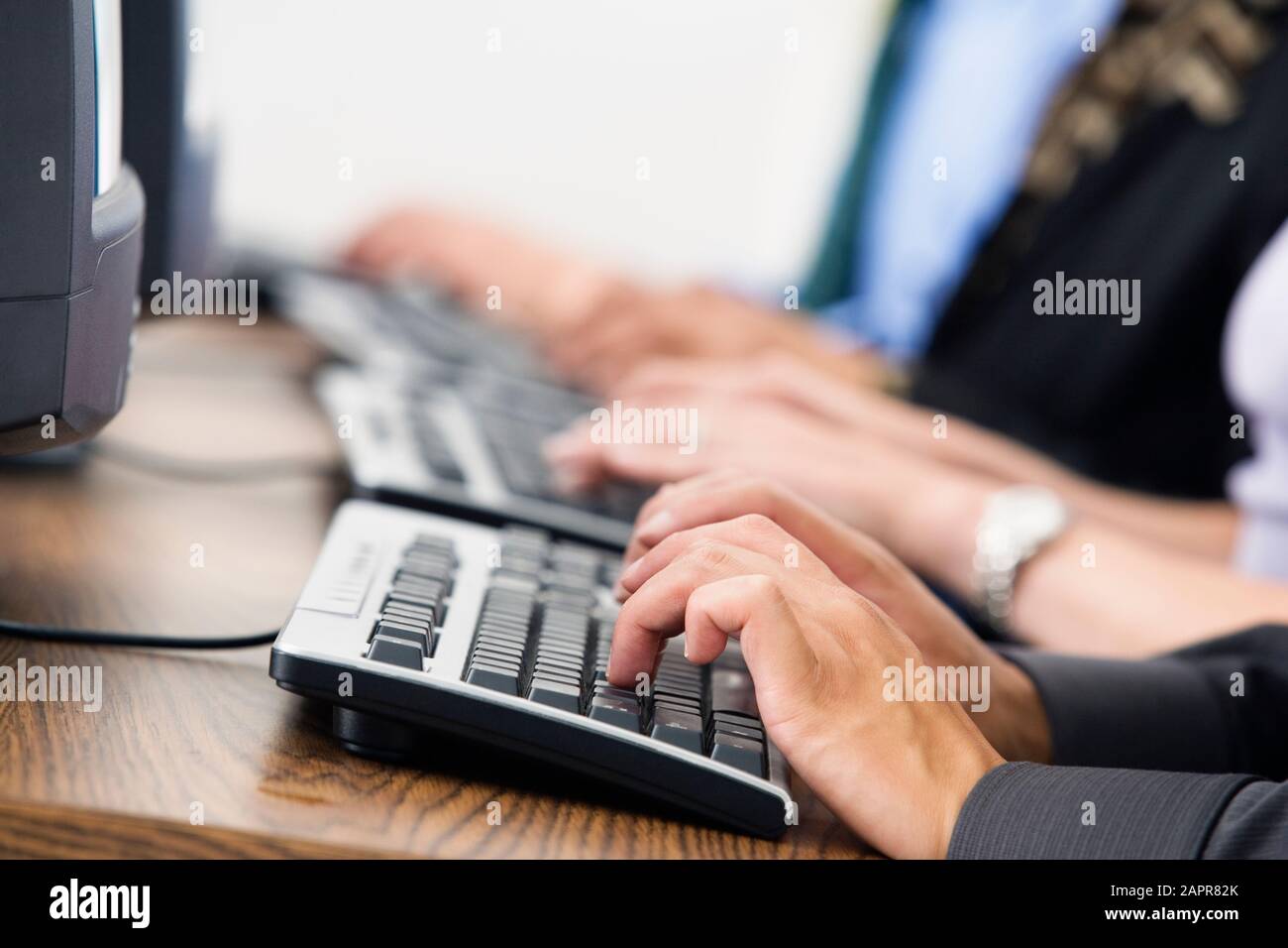 Indian women colleagues typing hi-res stock photography and images - Alamy