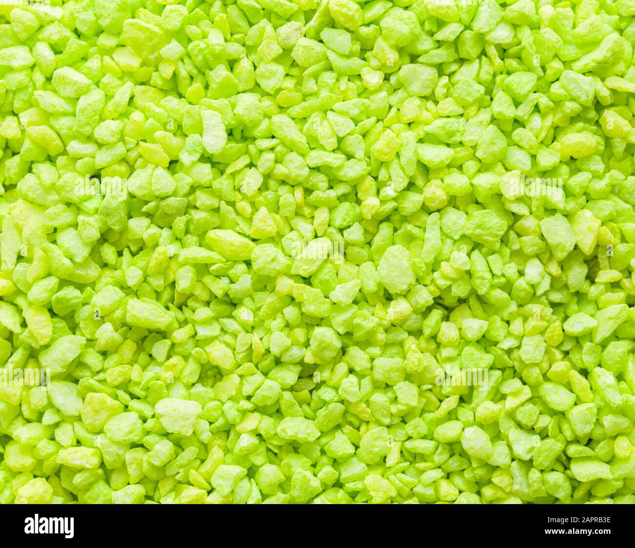 Small Bright Green Fish Tank Gravel Background. Stock Photo