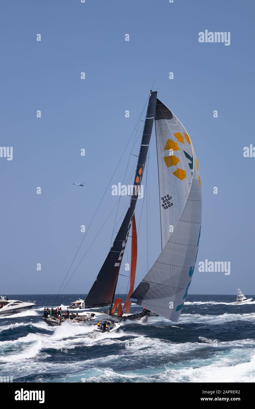 Sydney to Hobart Yacht Race 2019. Infotrack Supermaxi yacht at the start of the race leaving the heads of Sydney harbour. Rolex Sydney Hobart. Stock Photo