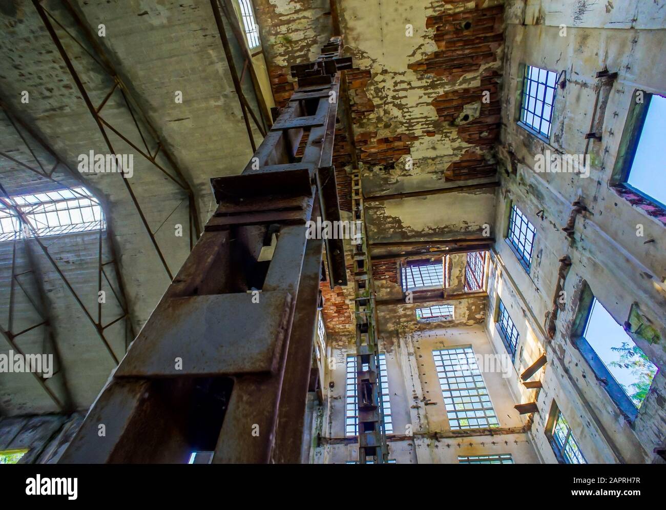 Low angle shot of an abandoned old construction building Stock Photo ...