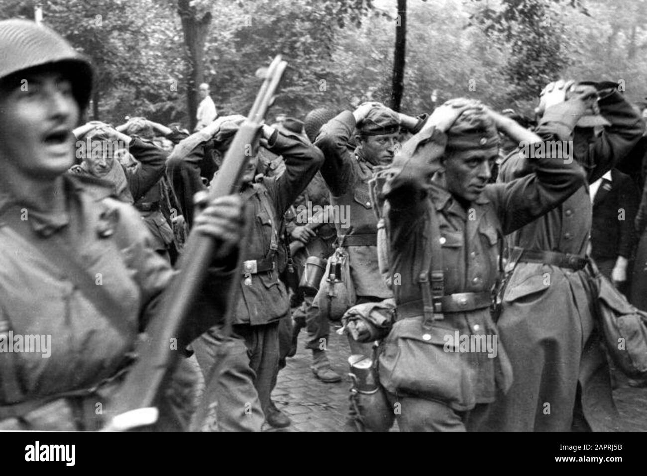 World War II. German soldiers are captured by American soldiers during the liberation of Maastricht. The Netherlands, Maastricht, 15 September 1944. Stock Photo