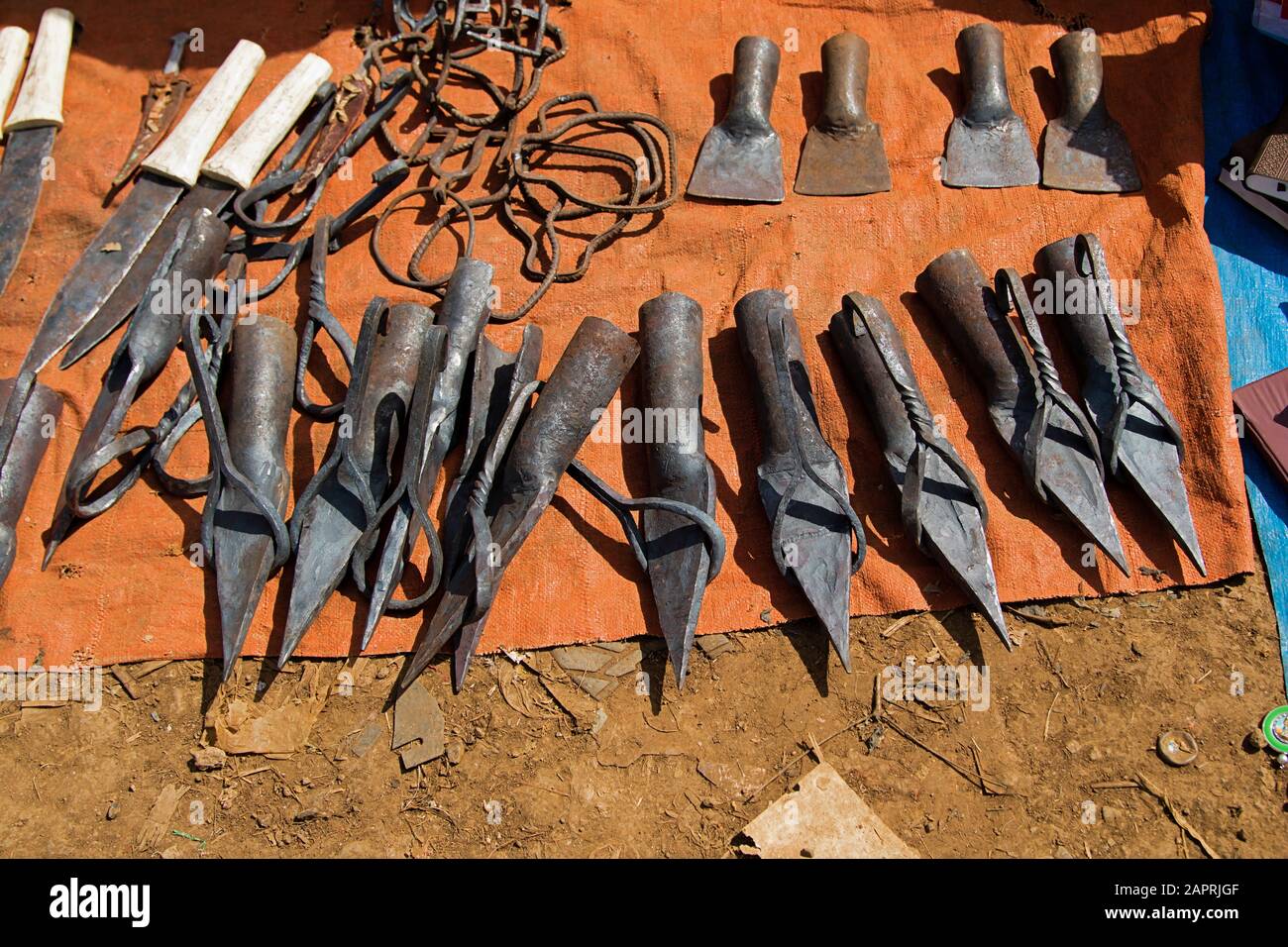 Iron made agricultural working tools on the local market of Bonga, in Kaffa Region, Ethiopia Stock Photo
