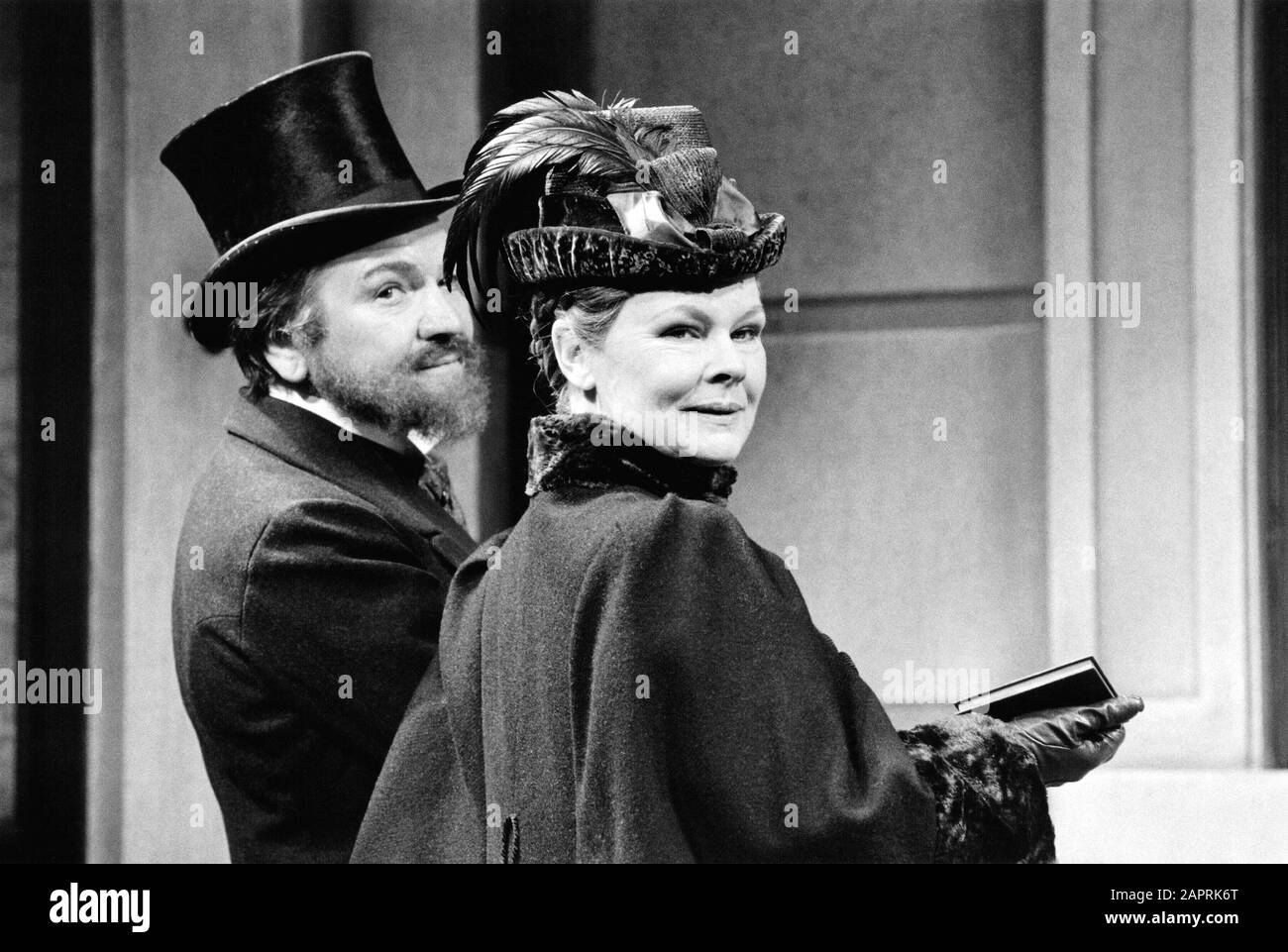 Michael Williams and Judi Dench as Charles and Carrie Pooter in MR & MRS NOBODY by Keith Waterhouse adapted from the novel 'The Diary of a Nobody' by George & Weedon Grossmith directed by Ned Sherrin at the Garrick Theatre, London in 1986. Dame Judith Olivia Dench CH DBE FRSA, born 1934. Married to the actor Michael Williams from 1971 until his death in 2001. They had one daughter, the actress Finty Williams, born in 1972. Stock Photo