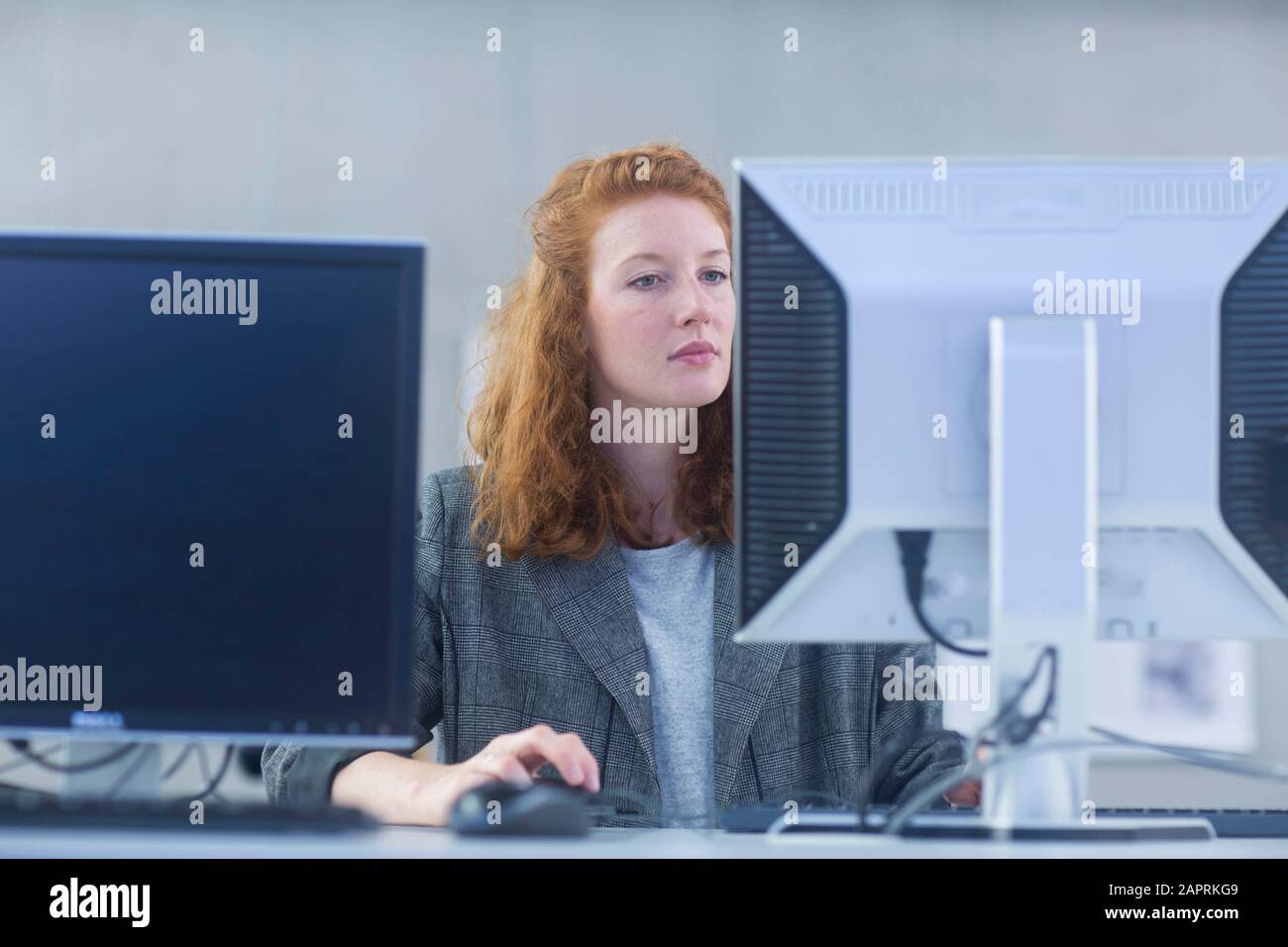 employee in an office concentrate Stock Photo