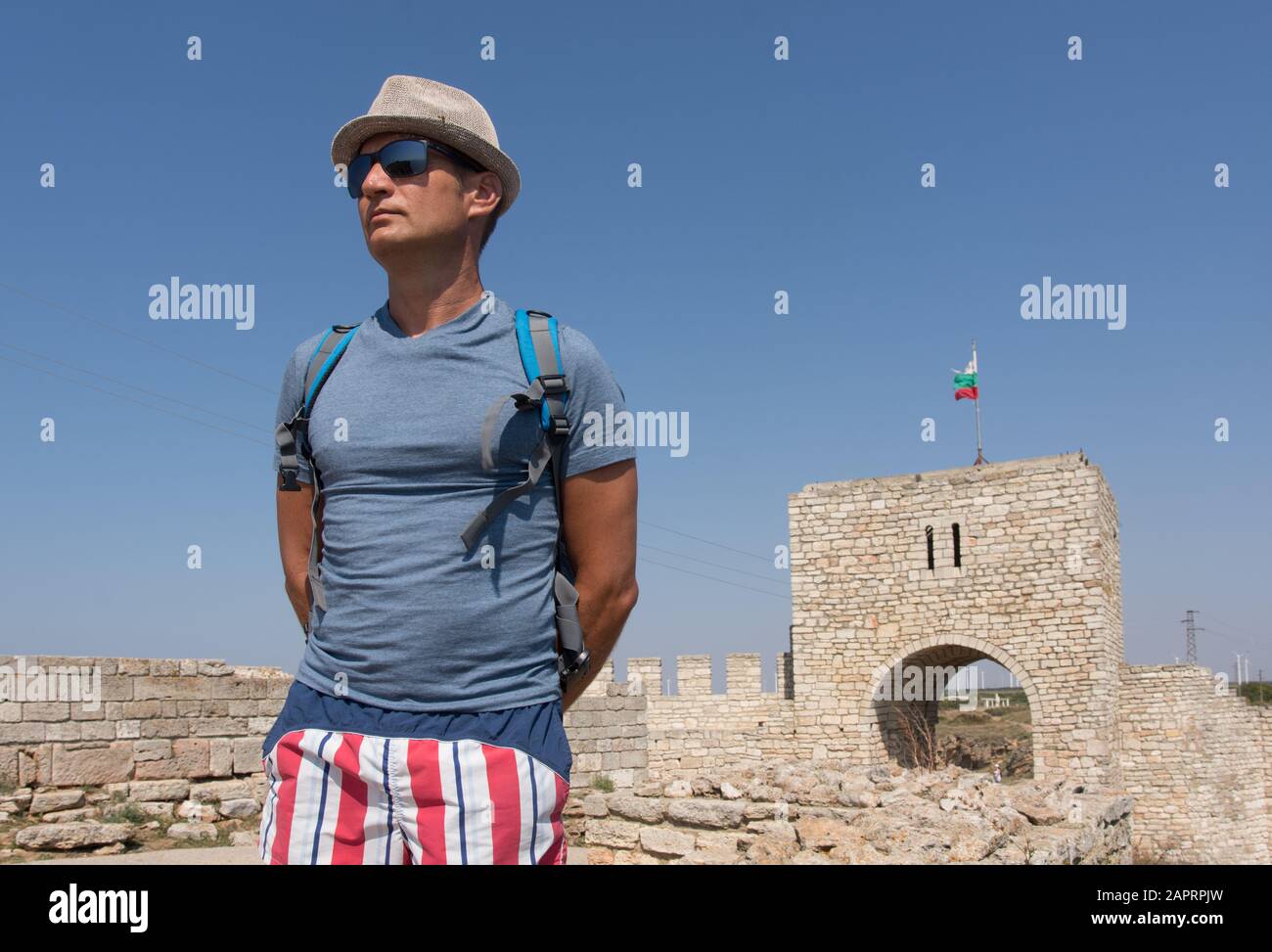 Adult man visits the historic fortress of Cape Kaliakra, Bulgaria Stock Photo