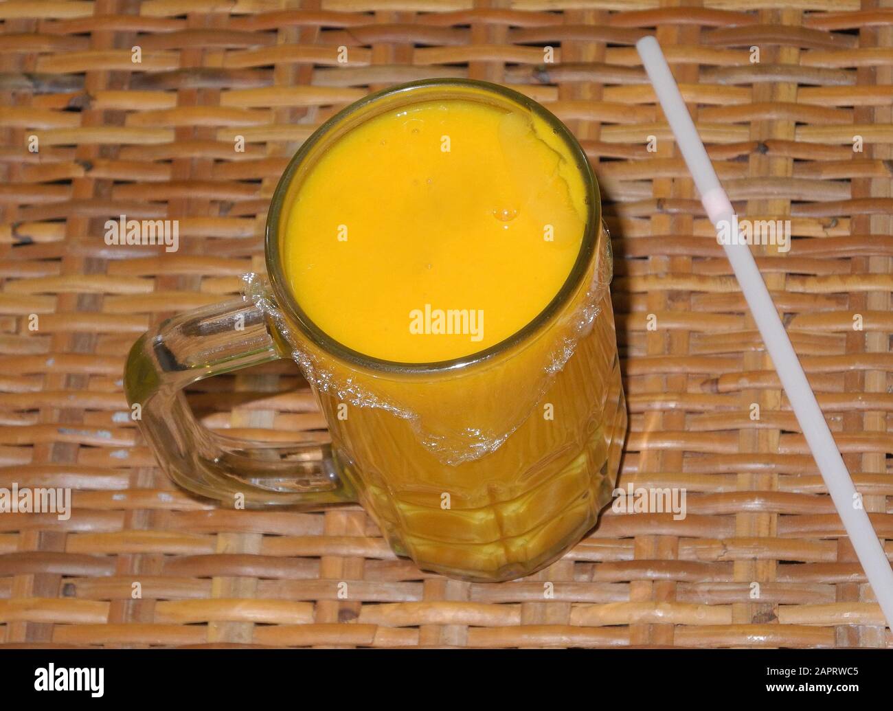 Mango juice glass film coated in Kochi, Kerala, India Stock Photo Alamy