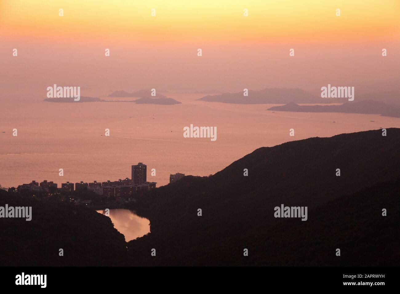 Hong Kong Islands - a view at sunset looking south-west over the islands in the South China Sea seen from the Peak, Hong Kong Island, Hong Kong Asia Stock Photo