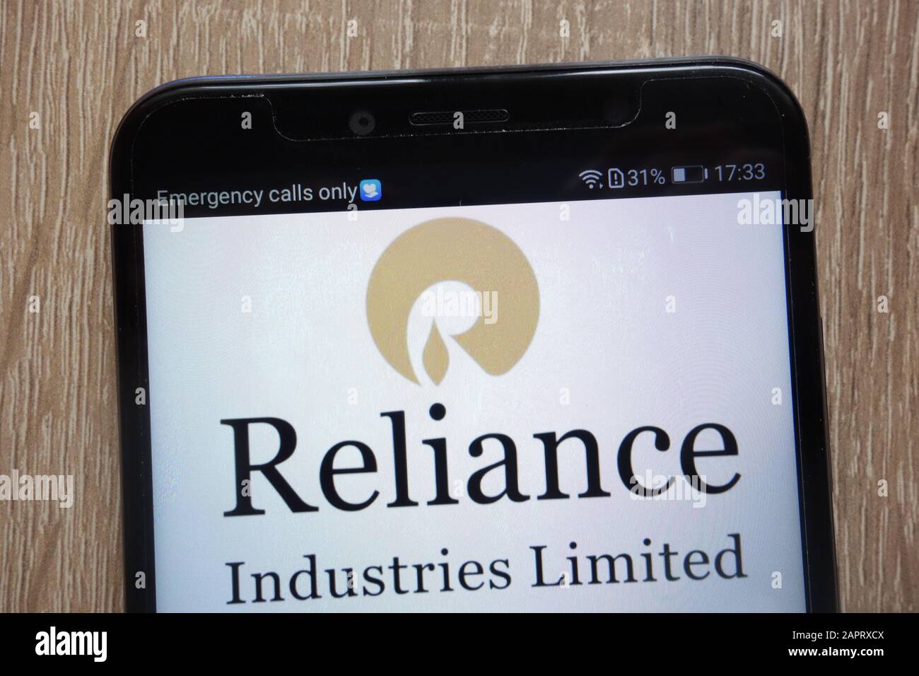 Reliance Industries logo displayed on a modern smartphone Stock Photo