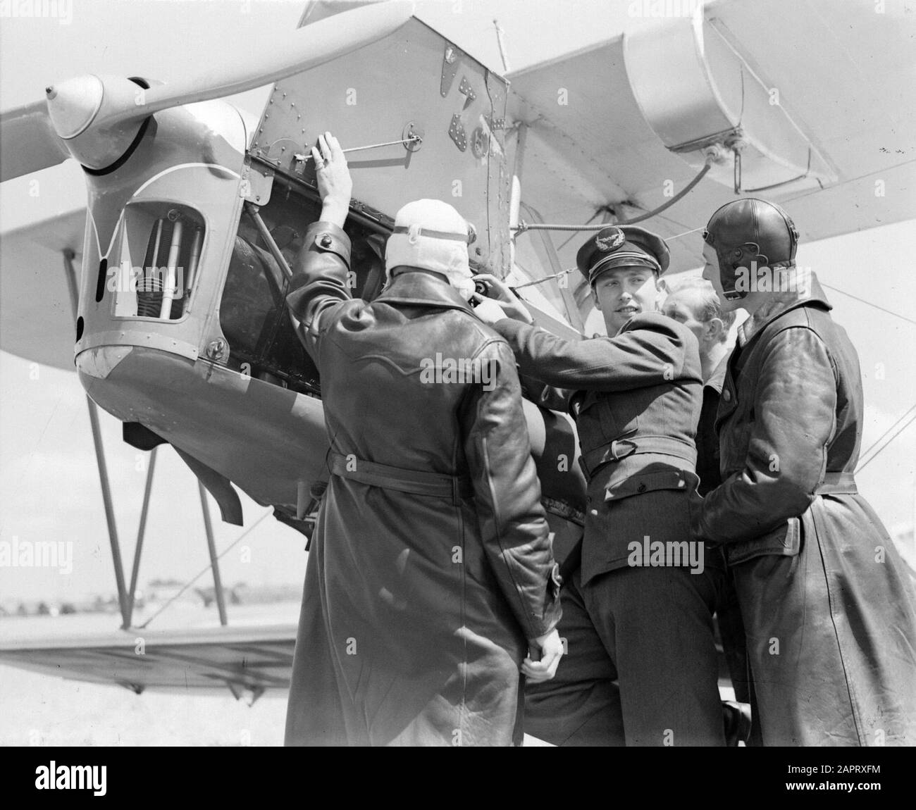 National Aviation School Holland  A Koolhoven FK 46 biplane of the National Aviation School Holland with open bonnet Date: July 1935 Location: Amsterdam, Noord-Holland Keywords: flight training, aircraft Stock Photo