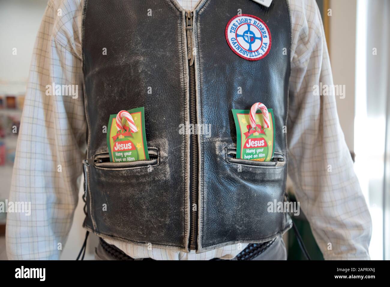 Jesus motorcycle vest worn by a church greeter. Stock Photo