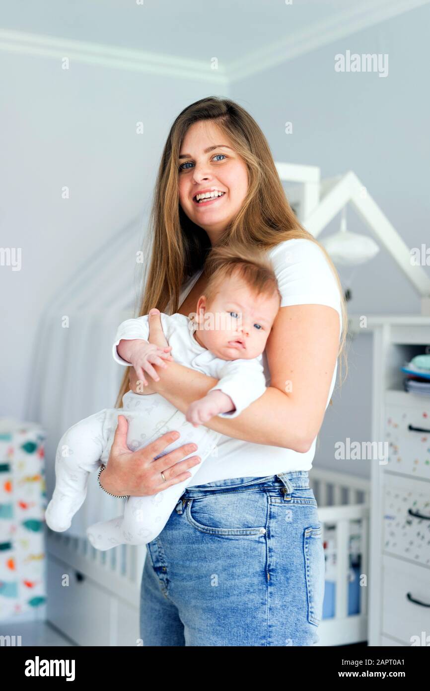 Beautiful mother son in arms hi-res stock photography and images - Alamy