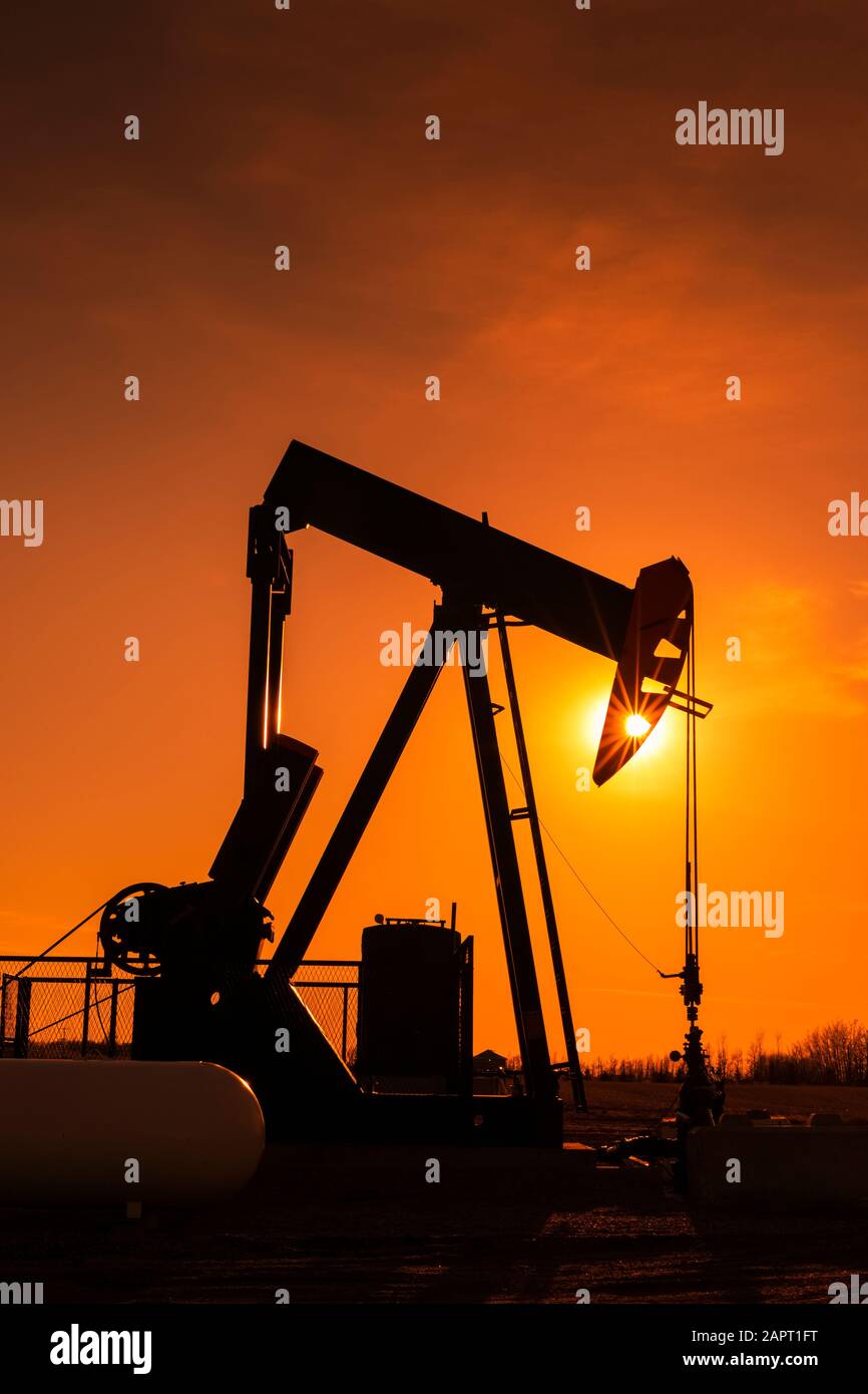 Pumpjack at sunset; Alberta, Canada Stock Photo Alamy