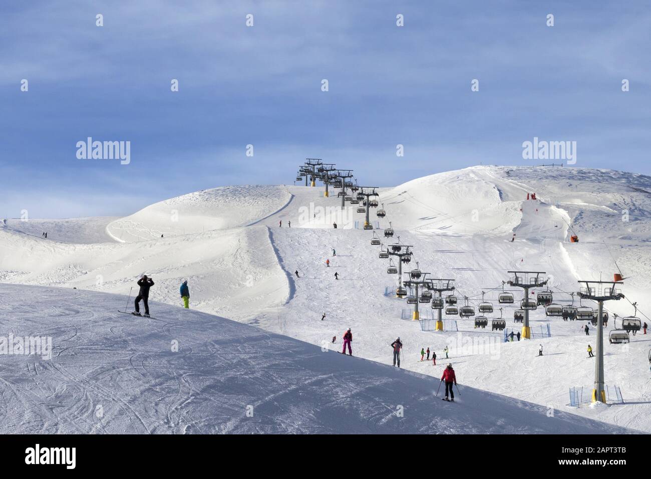 Snowy Ski Track Prepared By Snowcat Chair Lift Skiers And