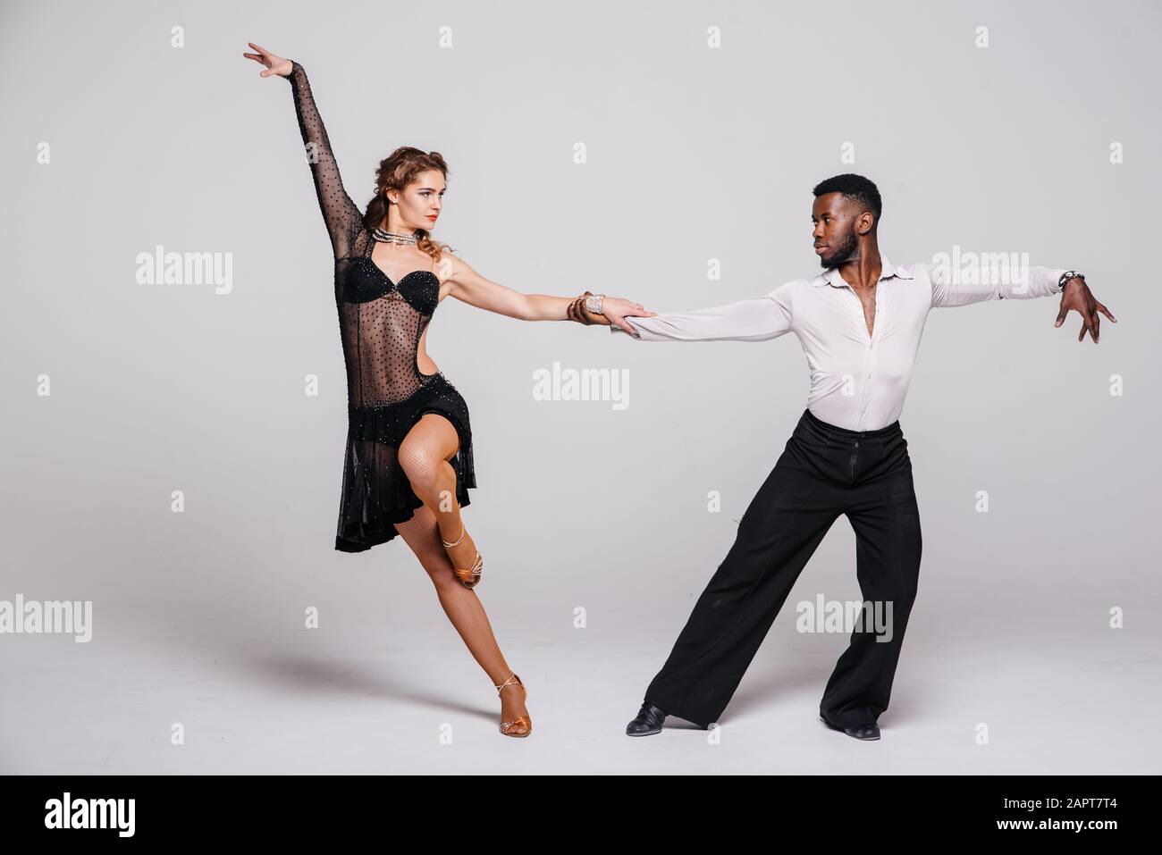 Flexible Young Modern Dance Couple Posing in Studio. Stock Photo - Image of  beautiful, dancing: 116958260