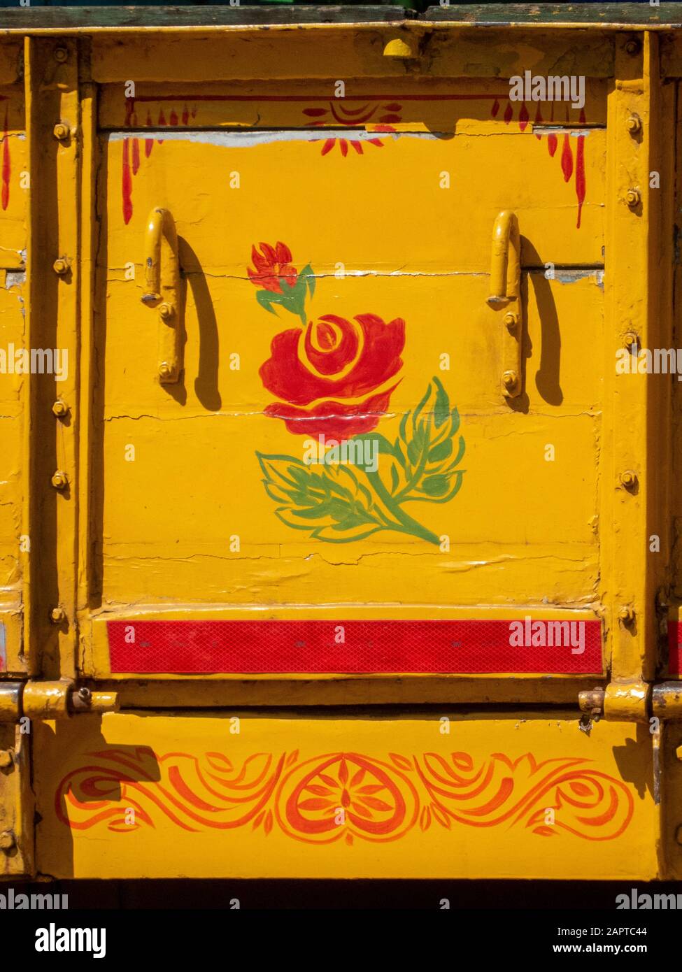 Flowers and scrolls decoration on back of lorry, Alappuzha / Alleppey, Kerala, India Stock Photo