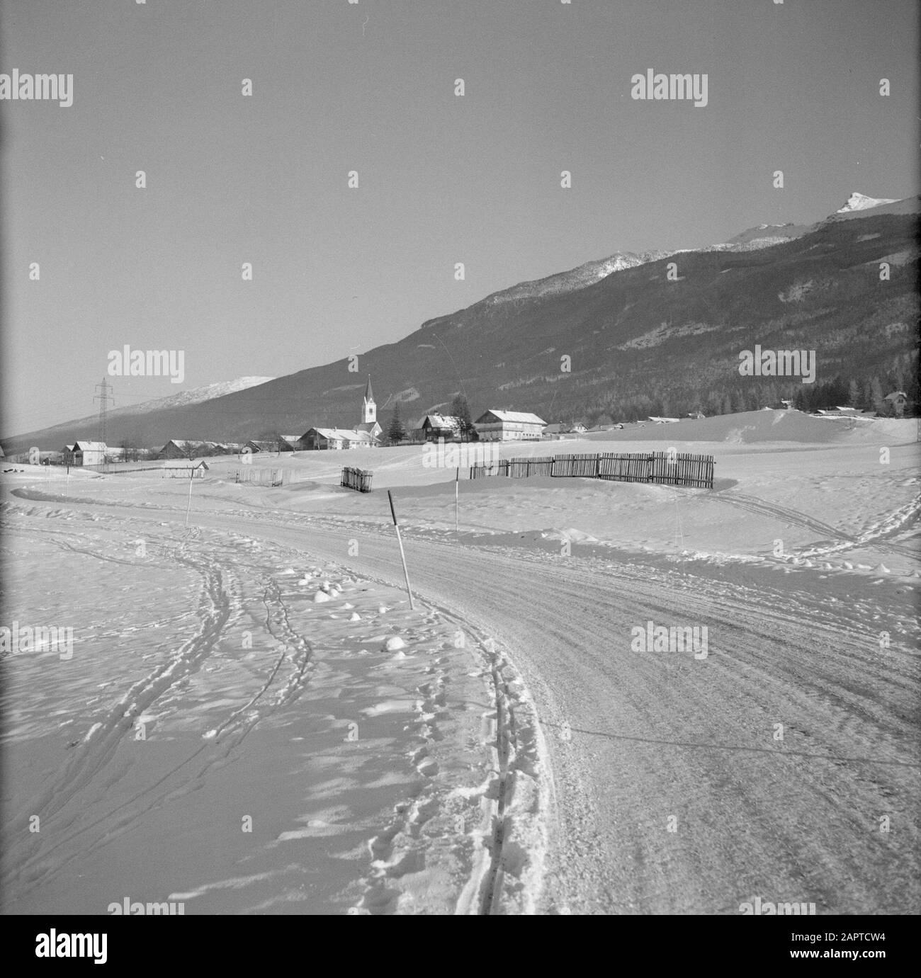 Winter in Tirol  View of Sistrans in the snow Date: January 1960 Location: Austria, Sistrans, Tyrol Keywords: mountains, villages, landscapes, snow, winter Stock Photo