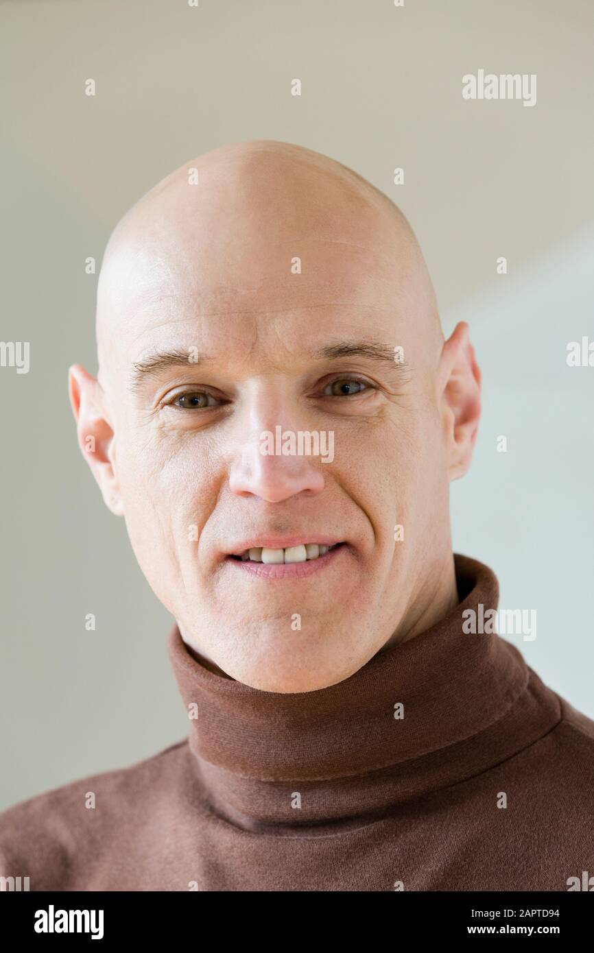 Portrait of a mid adult man smiling Stock Photo - Alamy