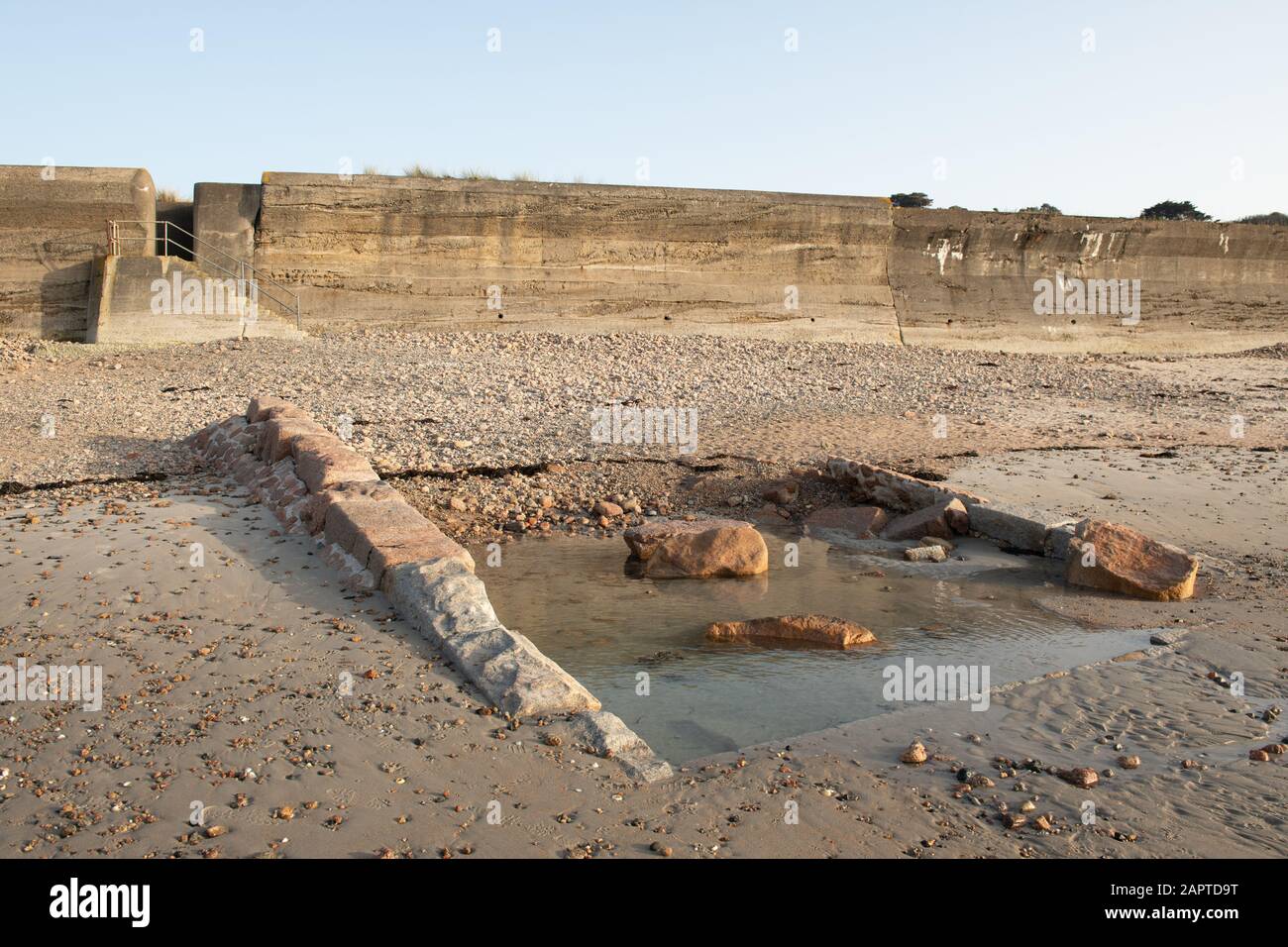 Remains of ruined slipway, la pulente jersey channel islands. Stock Photo