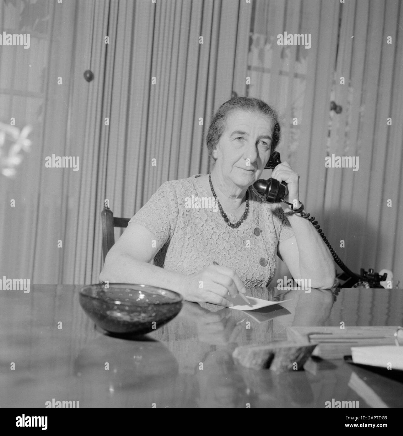 Golda Meir, Minister of Foreign Affairs of Israel while she calls Date: January 1, 1964 Location: Israel Keywords: ministers, portraits, telephones Personal name: Meir, Golda Stock Photo